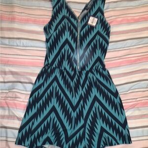*BRAND NEW/ TAGS ATTACHED* Women’s UK2LA Medium Chevron Teal/ Navy Romper W